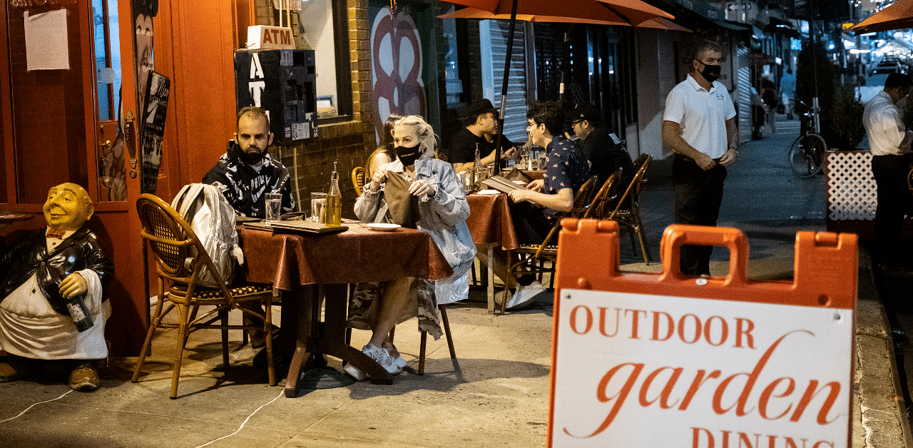 People enjoy outdoor dining amid the coronavirus disease (COVID-19) outbreak in Manhattan. Credits: Reuters Photo
