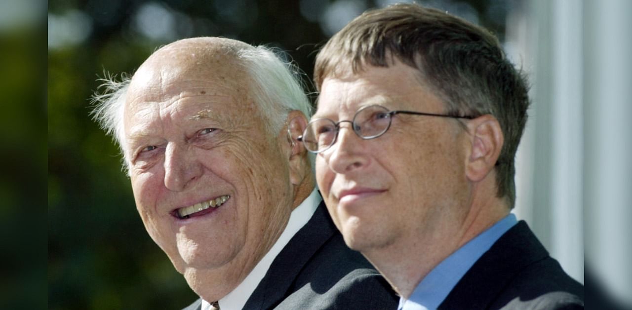 William H. Gates Sr., left, smiles while sitting next to his son, Bill Gates Jr. Credit: AP