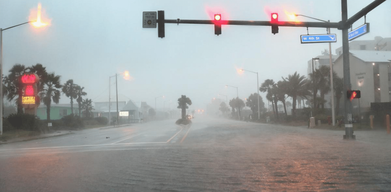  Water floods a road as the outer bands of Hurricane Sally come ashore in Gulf Shores, Alabama. The storm is bringing heavy rain, high winds and a dangerous storm surge from Louisiana to Florida. Credit: AFP Photo