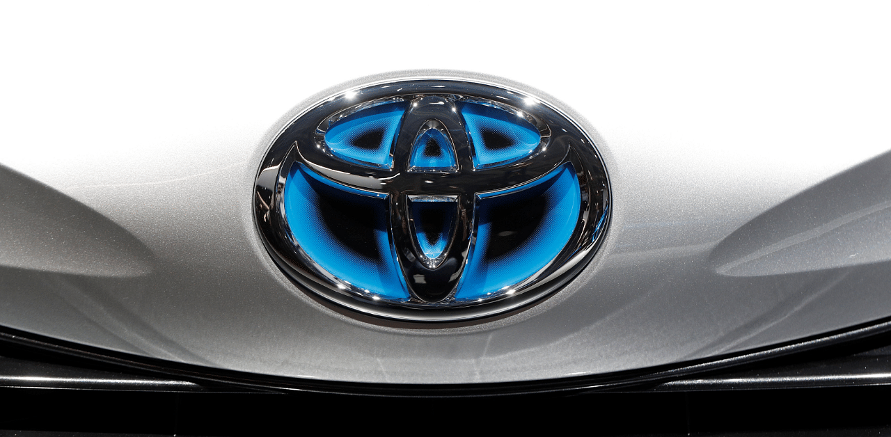 The Toyota logo is seen during the first press day of the Paris auto show, in Paris. Credit: Reuters Photo