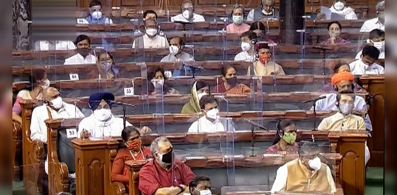 Parliamentarians in the Lok Sabha attend the ongoing Monsoon Session of Parliament, amid the ongoing coronavirus pandemic, in New Delhi, Tuesday, Sept. 15, 2020. Credit: LSTV/PTI Photo