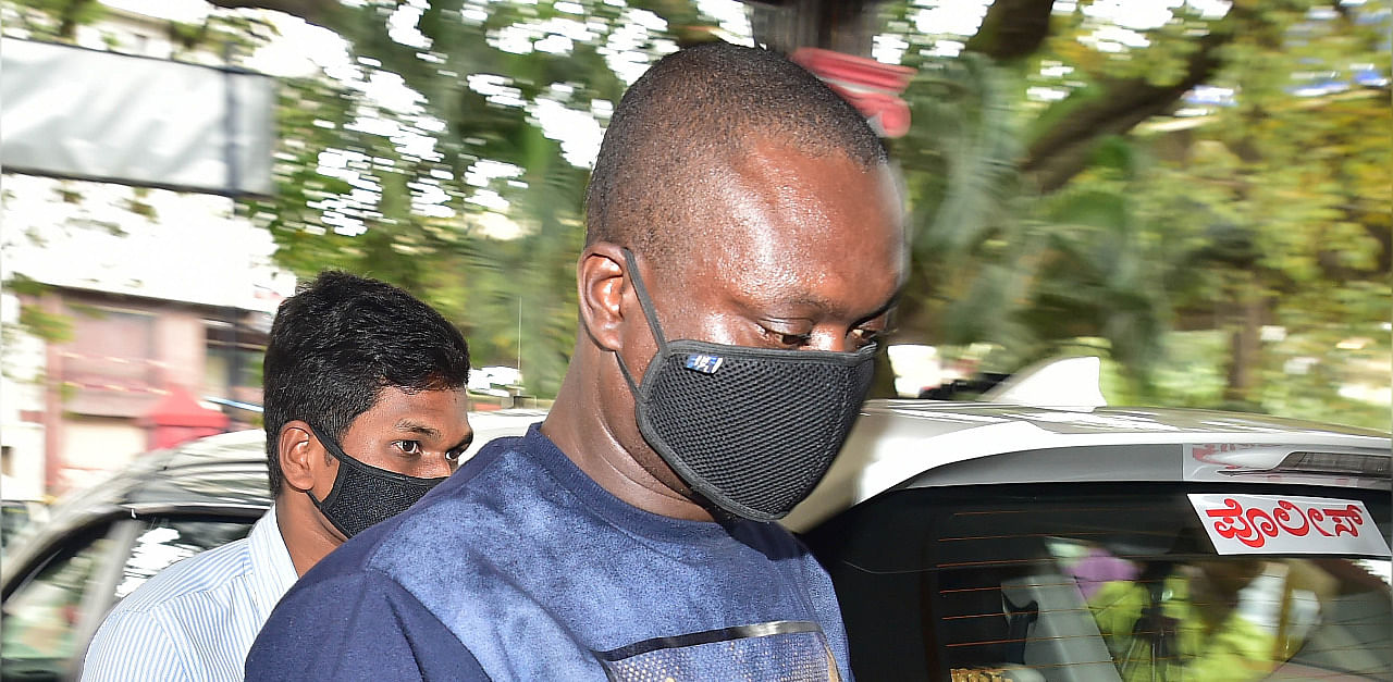 Senegalese national Benald Uddena after his arrest in Bengaluru on Wednesday. Credit: DH Photo