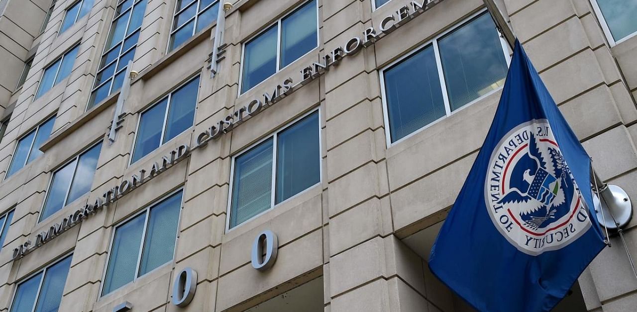 Department of Homeland Security flag flies outside the Immigration and Customs Enforcement (ICE) headquarters in Washington, DC. Credit: AFP
