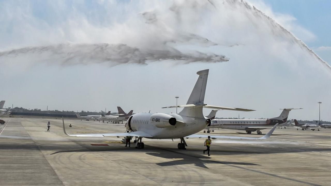 A private jet being accorded water salute during the inauguration of General Aviation Terminal by Civil Aviation Minister Hardeep Singh Puri (unseen), in New Delhi. Credit: PTI
