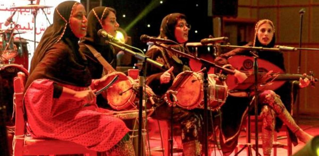 Members of the Iranian all-women music band "Dingo" (L to R) Malihe Shahinzadeh, Negin Heydari, Faezeh Mohseni, and Noushin Yousefzadeh perform together at a concert during the state-organised "Persian Gulf music" festival at Avini Hall in Iran's southern Gulf port city of Bandar Abbas. Credit: AFP Photo