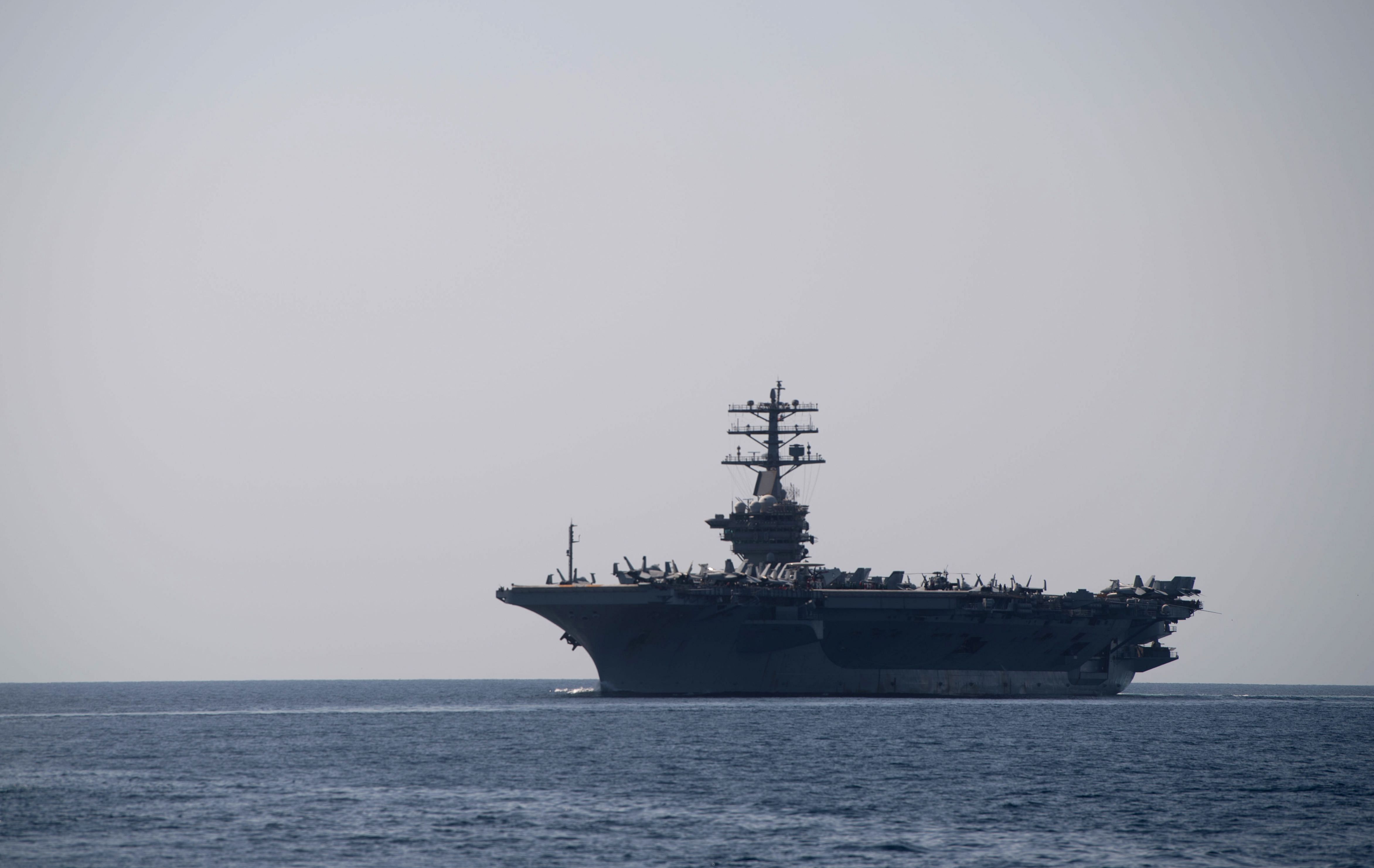 The aircraft carrier USS Nimitz transits the Strait of Hormuz. Credits: AFP Photo