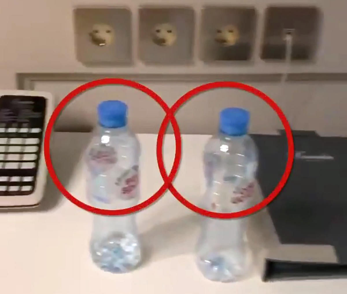 This grab taken from a video posted on September 17, 2020 on the Instagram account of @navalny shows bottles of Svyatoi Istochnik, or Holy Spring, mineral water, in the hotel room where opposition leader Alexei Navalny stayed during his visit to the Siberian city of Tomsk. Credit: AFP