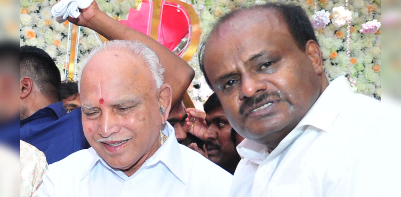 Karnataka Chief Minister B S Yediyurappa and JD(S) leader H D Kumaraswamy. Credit: File Photo/Special arrangement Photo