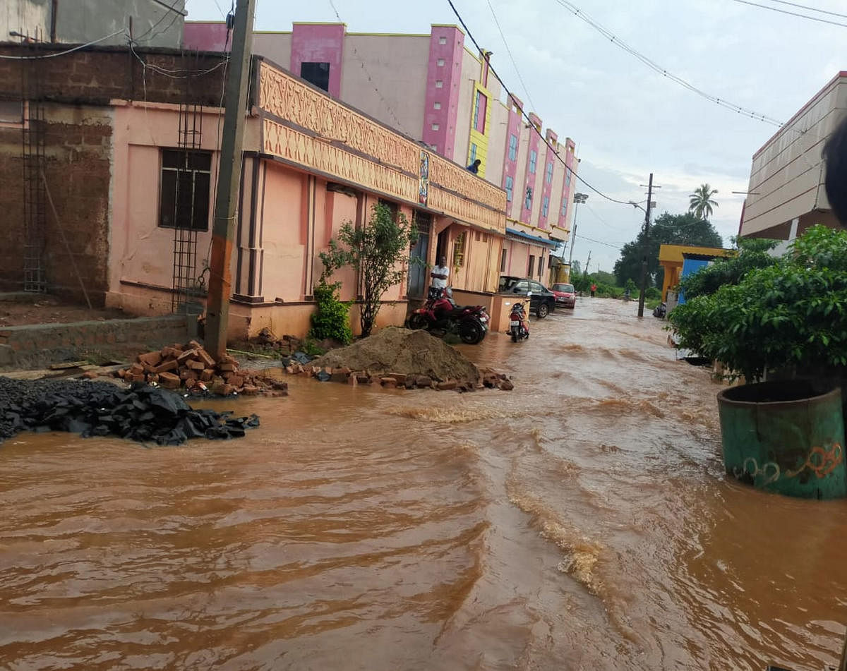 A flooded street in Halladakeri layout of Bidar. The city recorded 12.1 cm on Thursday. DH Photo