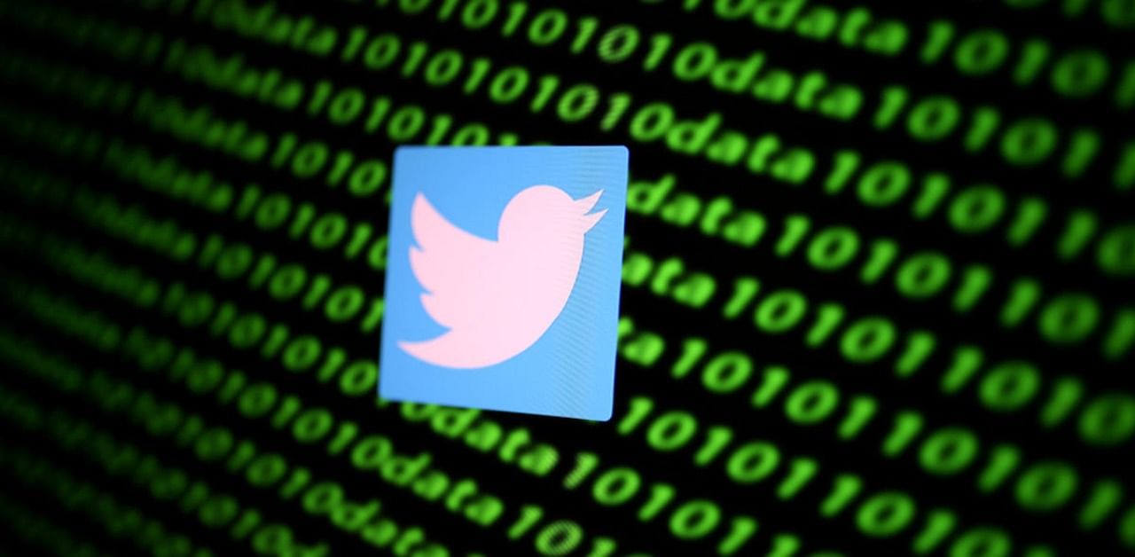 The Twitter logo and binary cyber codes. Representative Photo. Credit: Reuters