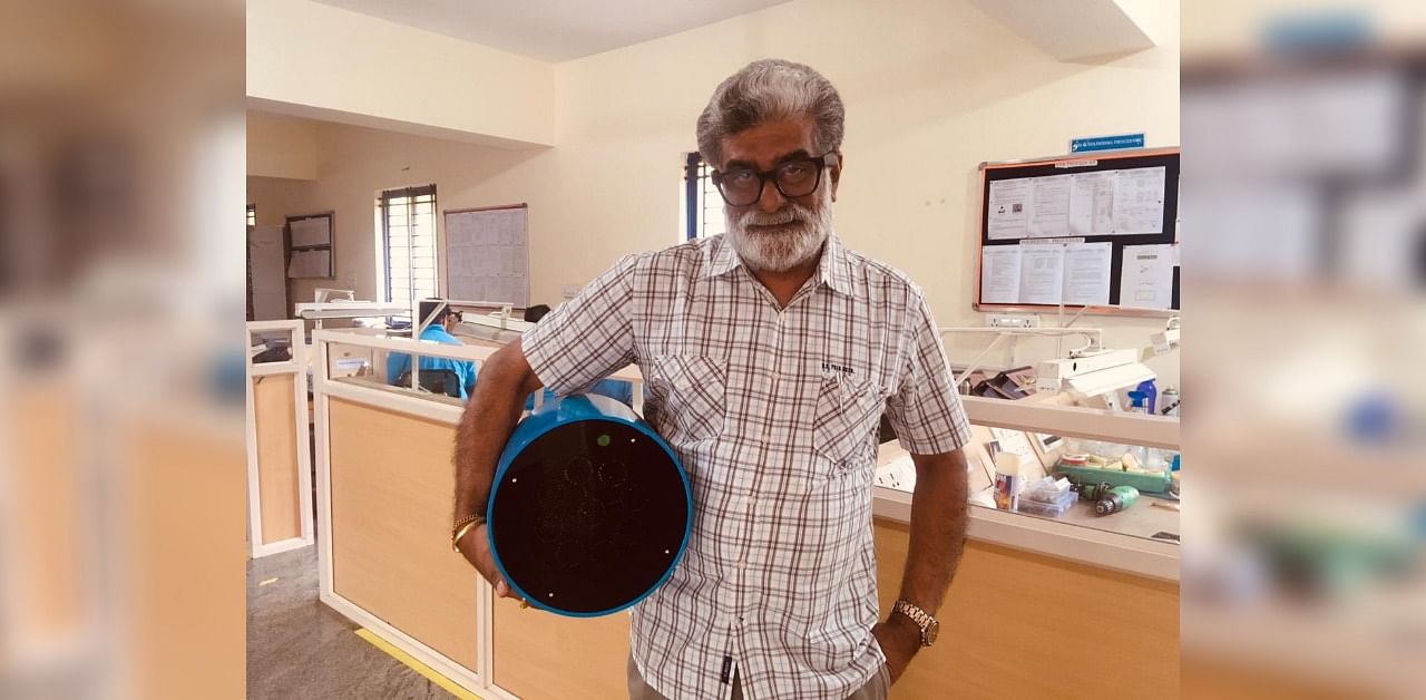 Dr Rajah Vijay Kumar with Shycocan, a medical device designed, created and assembled at the Bengaluru-based Organisation de Scalene to prevent transmission of the SARS-CoV-2 in public areas. Credit: DH Photo