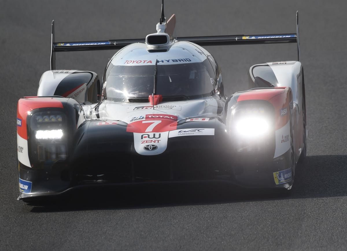 Japan's driver Kamui Kobayashi competes on his Toyota TS050 Hybrid LMP1 WEC N°7 during the qualifying practice session, of the 88th edition of Le Mans 24 Hours endurance race. Credit: AFP