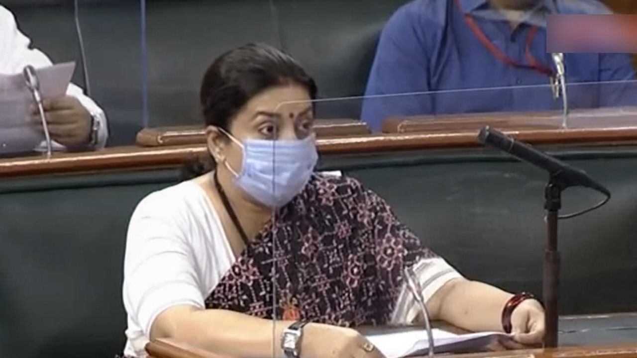 Union Minister for Women and Child Development Smriti Irani in the Lok Sabha during the ongoing Monsoon Session of Parliament, amid the ongoing coronavirus pandemic, in New Delhi. Credit: PTI.