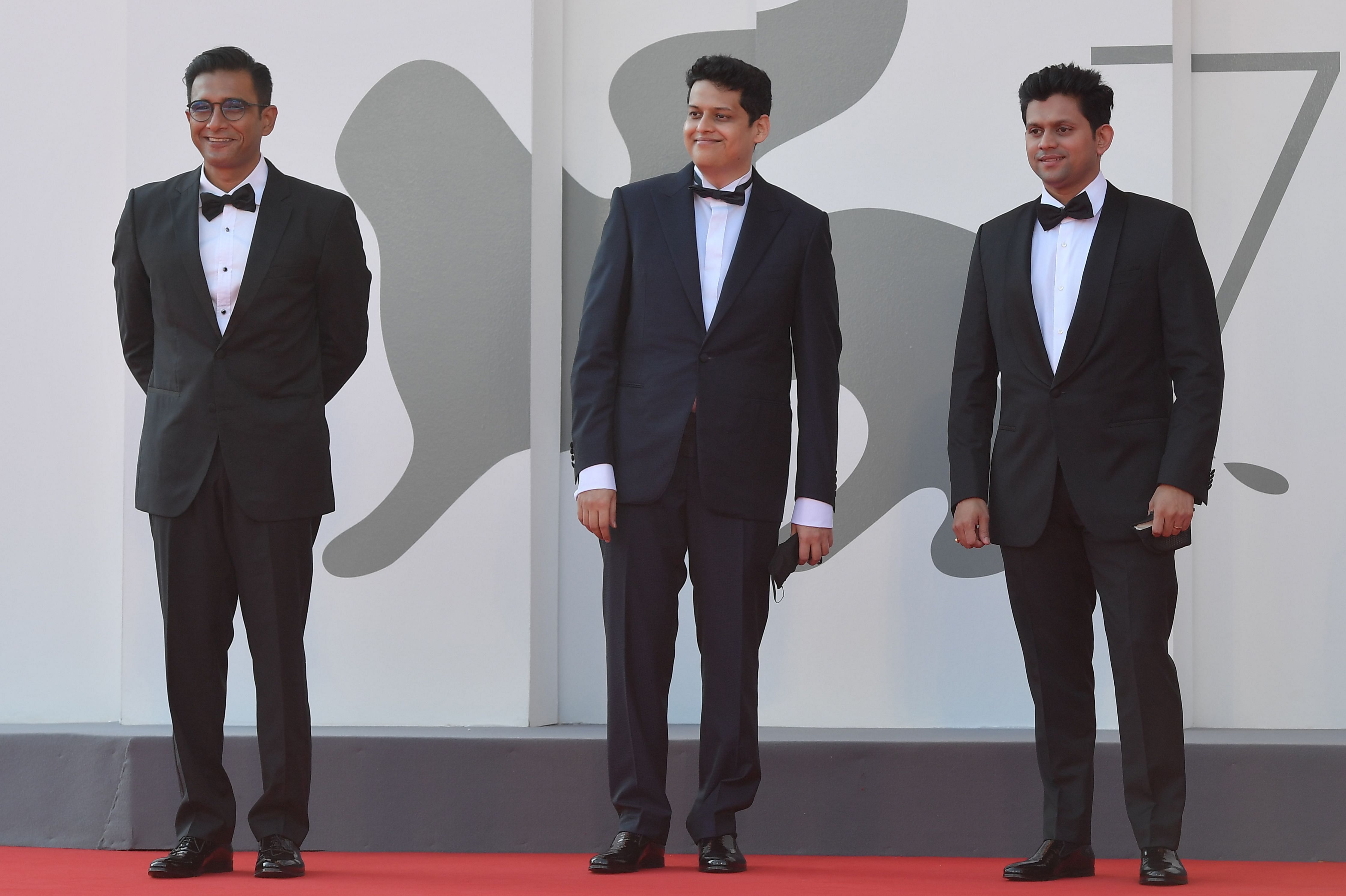 Producer Vivek Gomber, Chaitanya Tamhane and actor Aditya Modak at the screening of the film 'The Disciple' at the 77th Venice Film Festival, on September 4. AFP