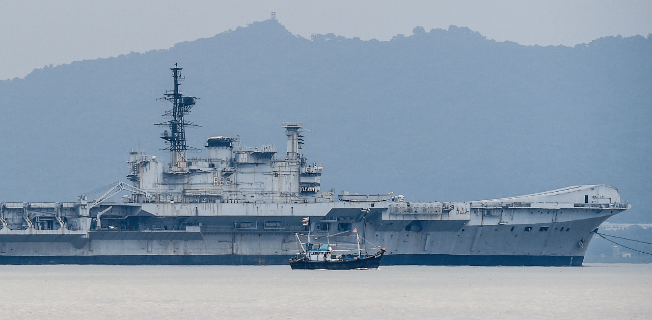 Indian Navy's decommissioned warship aircraft carrier INS Viraat is towed away by boats on its final journey to the Alang Ship breaking yard in Gujarat, from the naval dockyard in Mumbai. Credit: AFP Photo