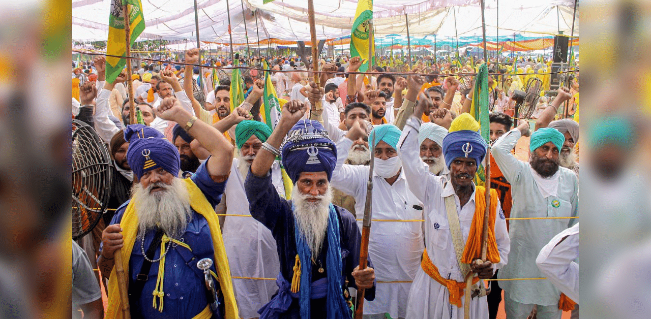 Members of various farmers' organizations stage a protest against the central government over agriculture related ordinances, in Patiala, Saturday, Sept. 19, 2020. Credit: PTI Photo