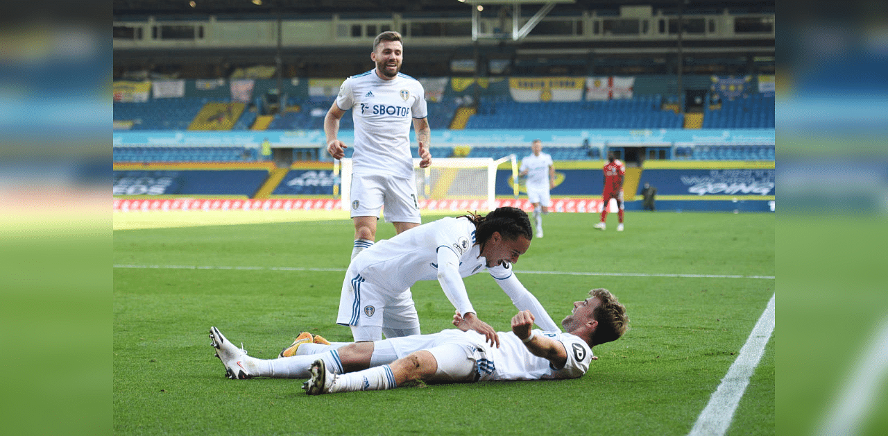 Leeds United's Helder Costa celebrates scoring their fourth goal with Patrick Bamford. Credit: Reuters Photo