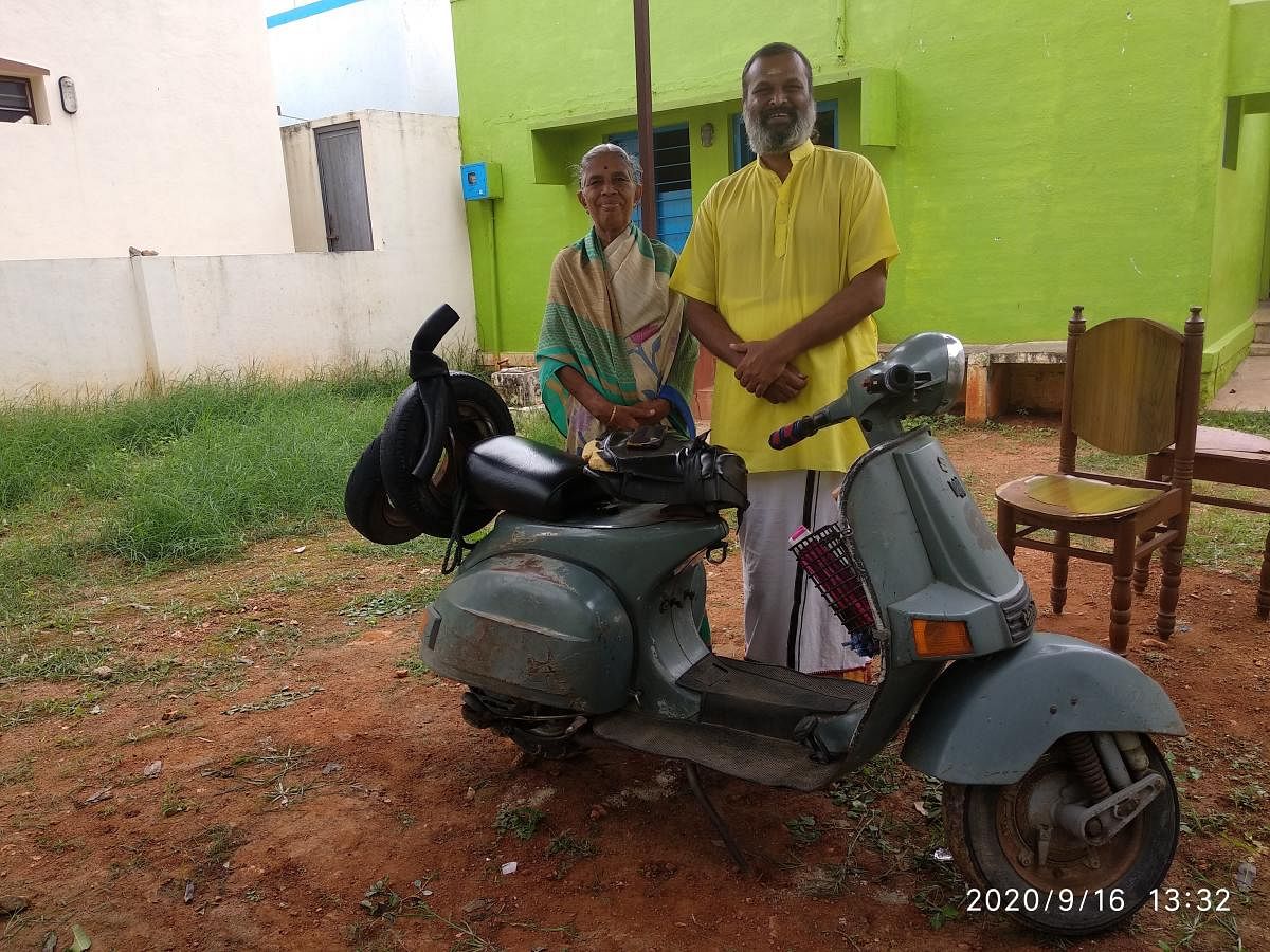 D Krishna Kumar and his mother Chudarathna near their house at Bogadi village, on the outskirts of Mysuru.