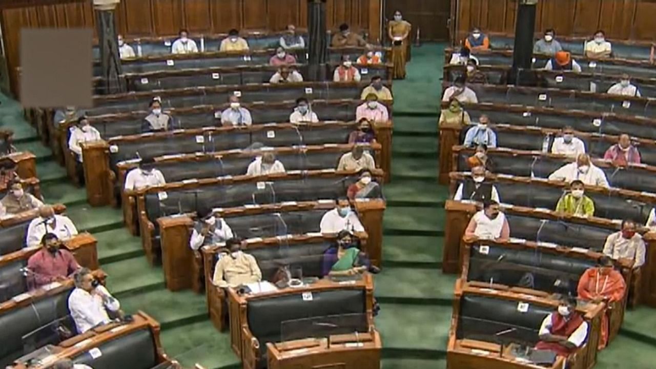 Parliamentarians in Lok Sabha during the ongoing Monsoon Session of Parliament, in New Delhi. Credit: PTI.