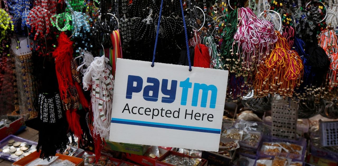 An advertisement of Paytm, a digital wallet company, is pictured at a road side stall in Kolkata. Credit: Reuters