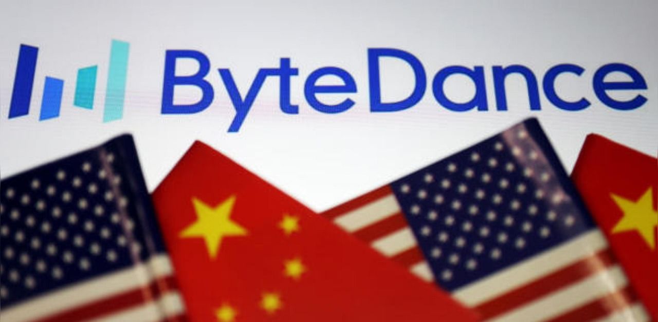 Flags of China and U.S. are seen near a Bytedance logo. Credit: Reuters Photo