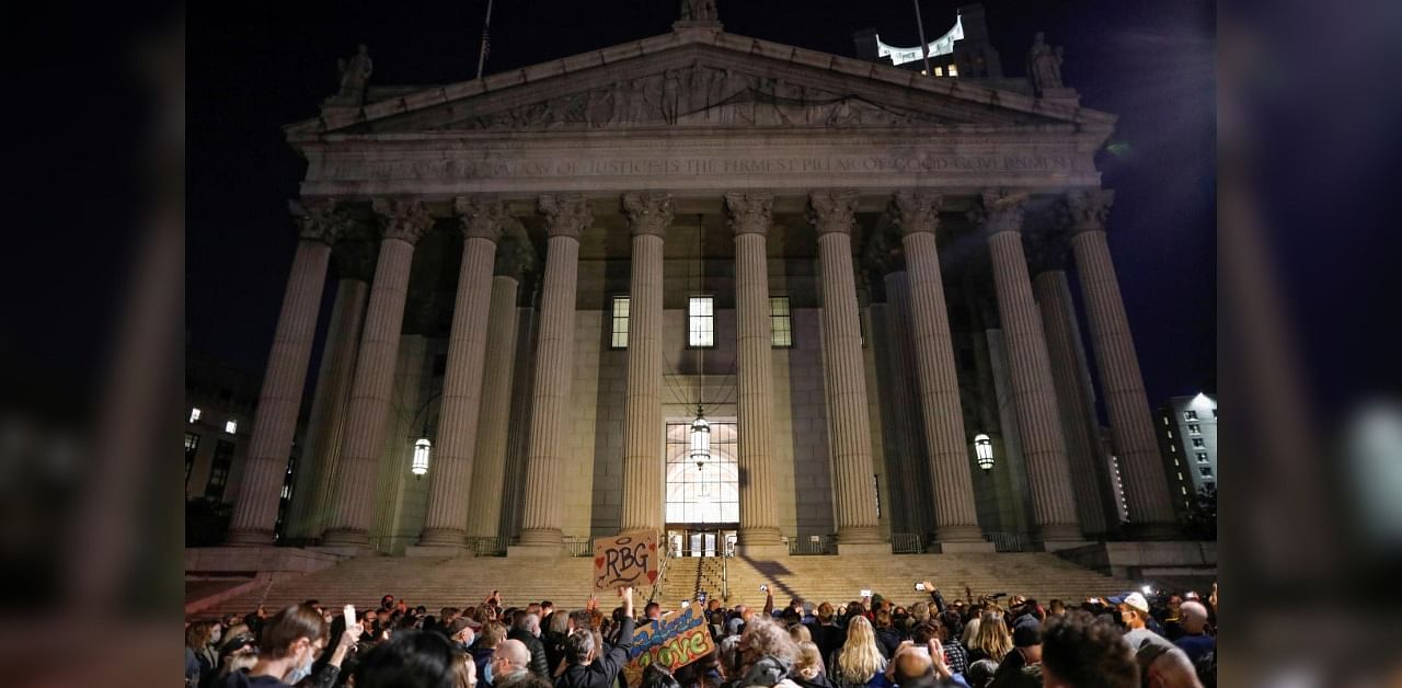 People gather for a vigil outside of the New York State Civil Supreme Court building held for recently passed Associate Justice of the Supreme Court of the United States Ruth Bader Ginsburg in Manhattan, New York City. Credit: Reuters