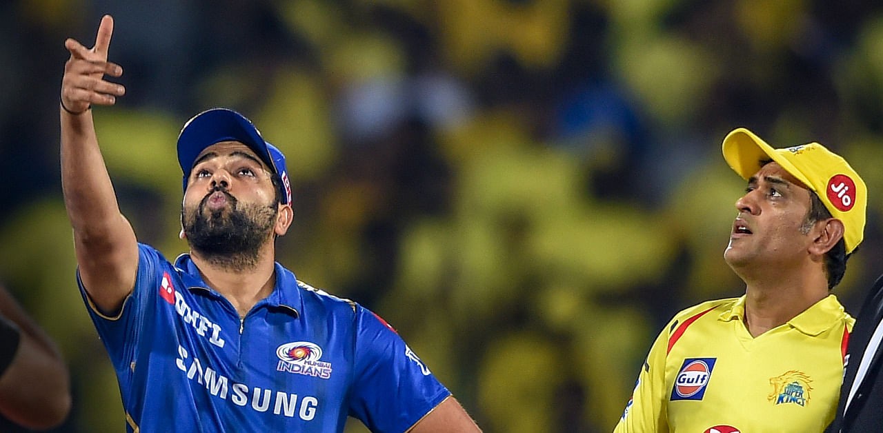 Mumbai Indians captain Rohit Sharma with CSK captain and former India skipper M S Dhoni. Credit: PTI Photo