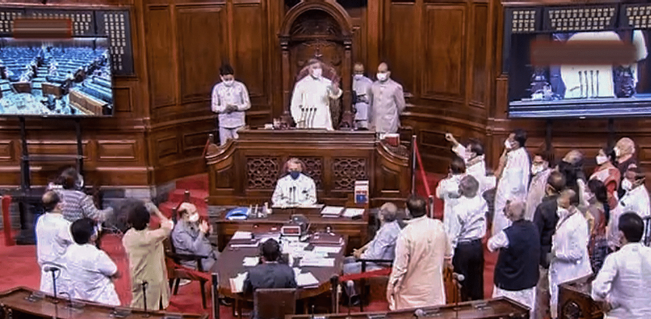 Opposition leaders stage a protest in the Rajya Sabha over suspension of 8 MPs for causing ruckus in the upper house. Credit: PTI Photo