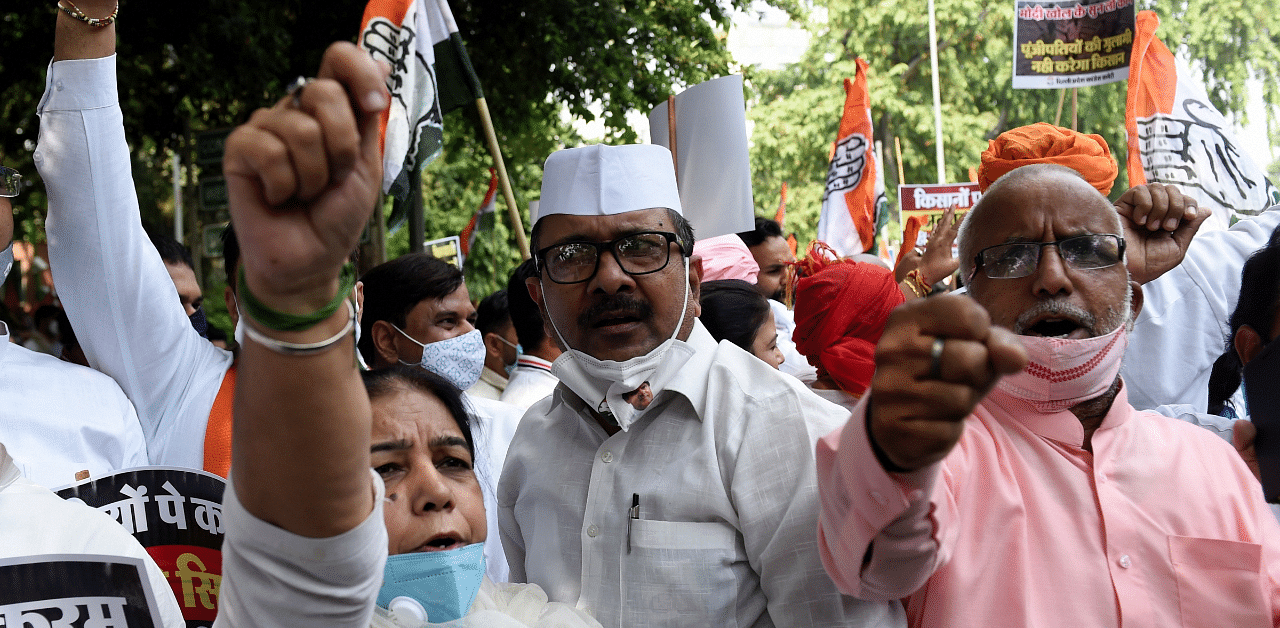 Congress workers protest over farm bills, in New Delhi, September 21. Credit: PTI Photo