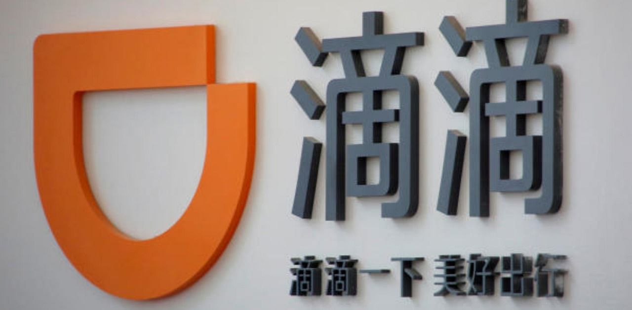 The logo of Didi Chuxing is seen at its headquarters in Beijing, China. Credit: Reuters photo