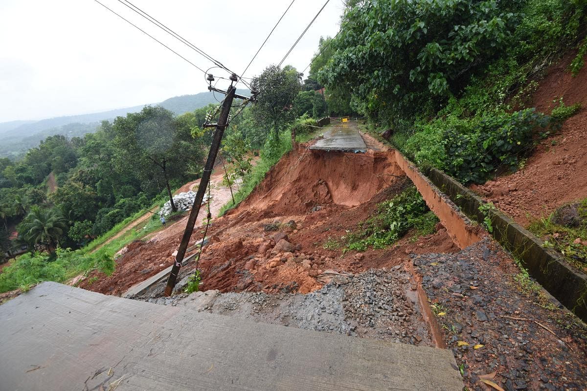A concrete road was damaged after the earth below it caved in at Neermarga.