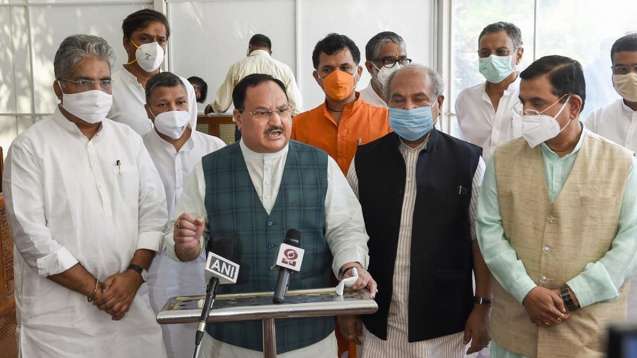 BJP National President JP Nadda, flanked by Union Ministers Narendra Singh Tomar and Pralhad Joshi and party MP Bhupender Yadav, addresses the media after passing of two farm bills in the Rajya Sabha during the ongoing Monsoon Session. Credit: PTI.