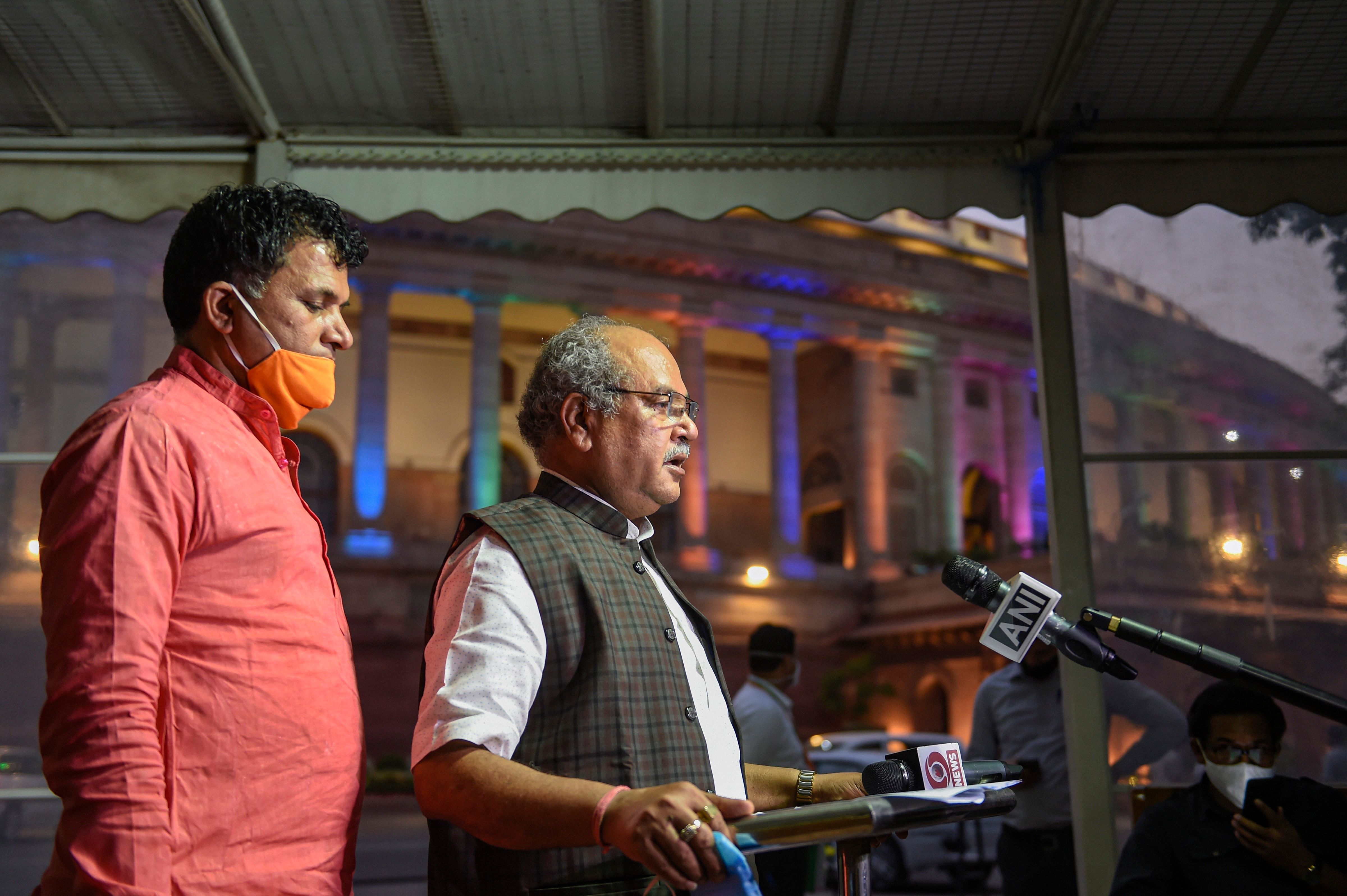 Union Agriculture Minister Narendra Singh Tomar with Minister of State for Agriculture Kailash Choudhary addresses the media in Parliament House premises. Credits: PTI Photo