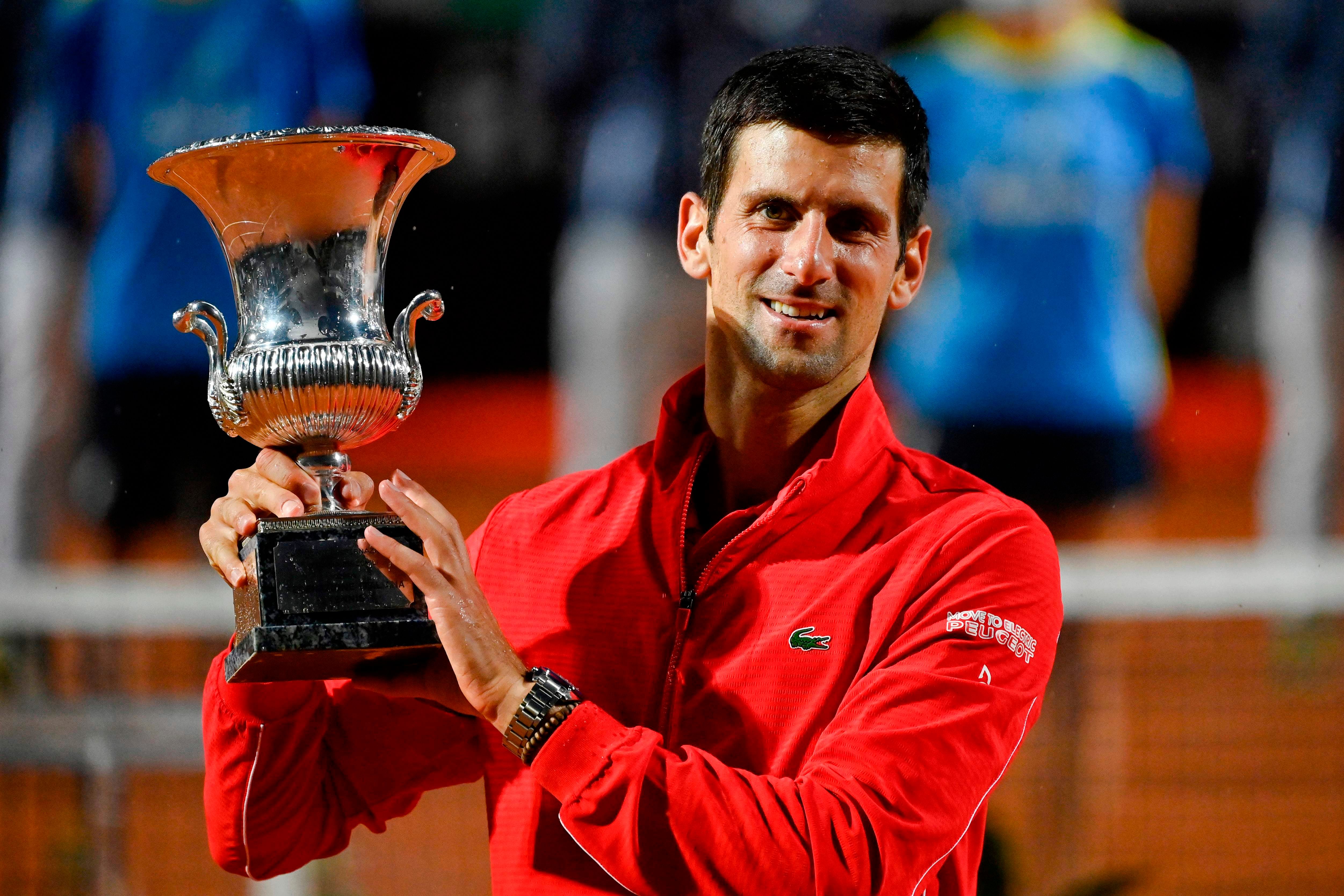 Serbia's Novak Djokovic poses with his trophy after winning the final match of the Men's Italian Open against Argentina's Diego Schwartzman at Foro Italico. Credits: AFP Photo