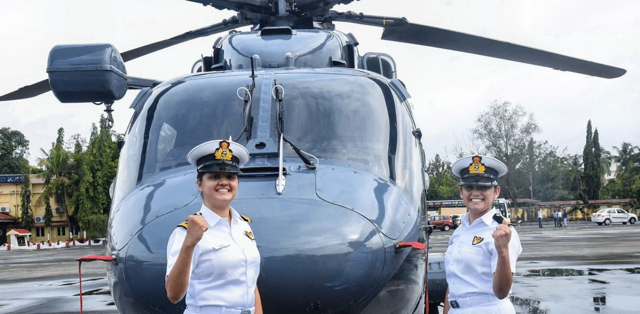 Sub Lt. Riti Singh and Sub Lt. Kumudini Tyagi, the first women airborne tacticians who will operate from deck of warships, pose for pictures after they passed out of Indian Navy's Observer Course, at Southern Naval Command, Kochi. Credit: PTI Photo