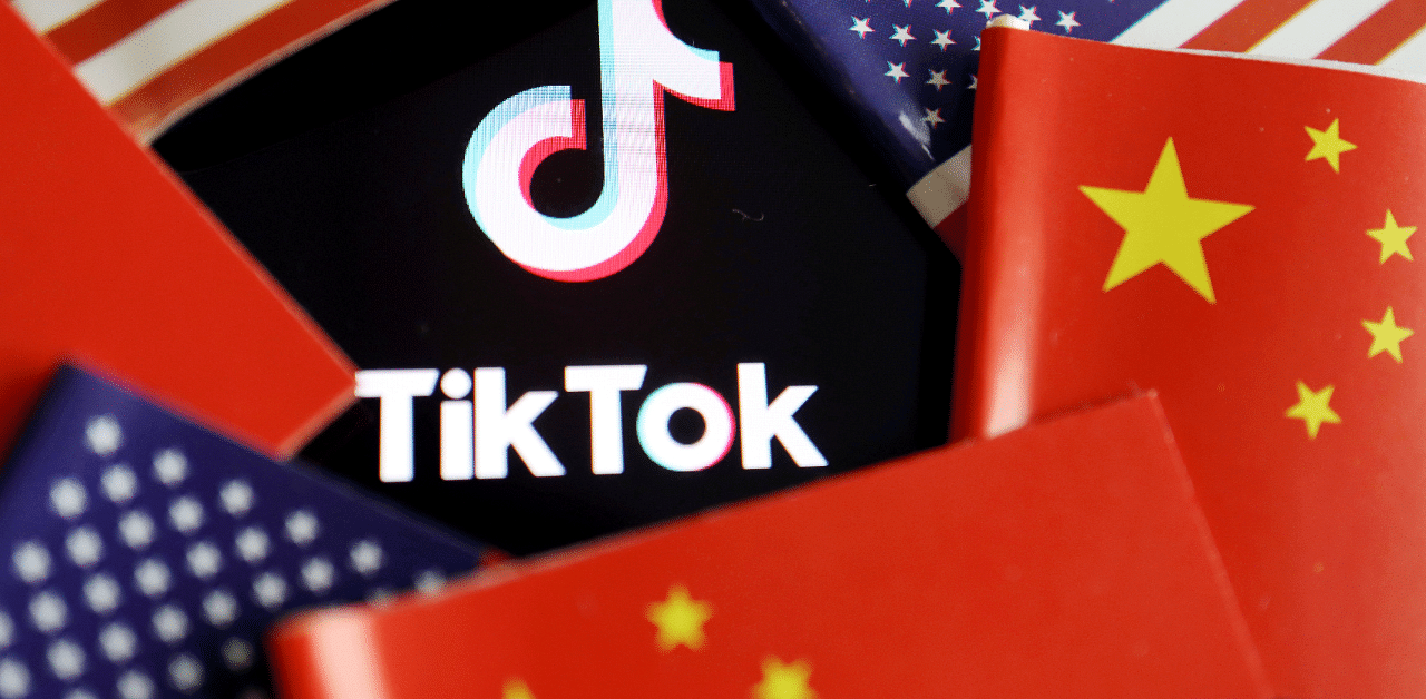 China and US flags are seen near a TikTok logo. Credit: Reuters Photo