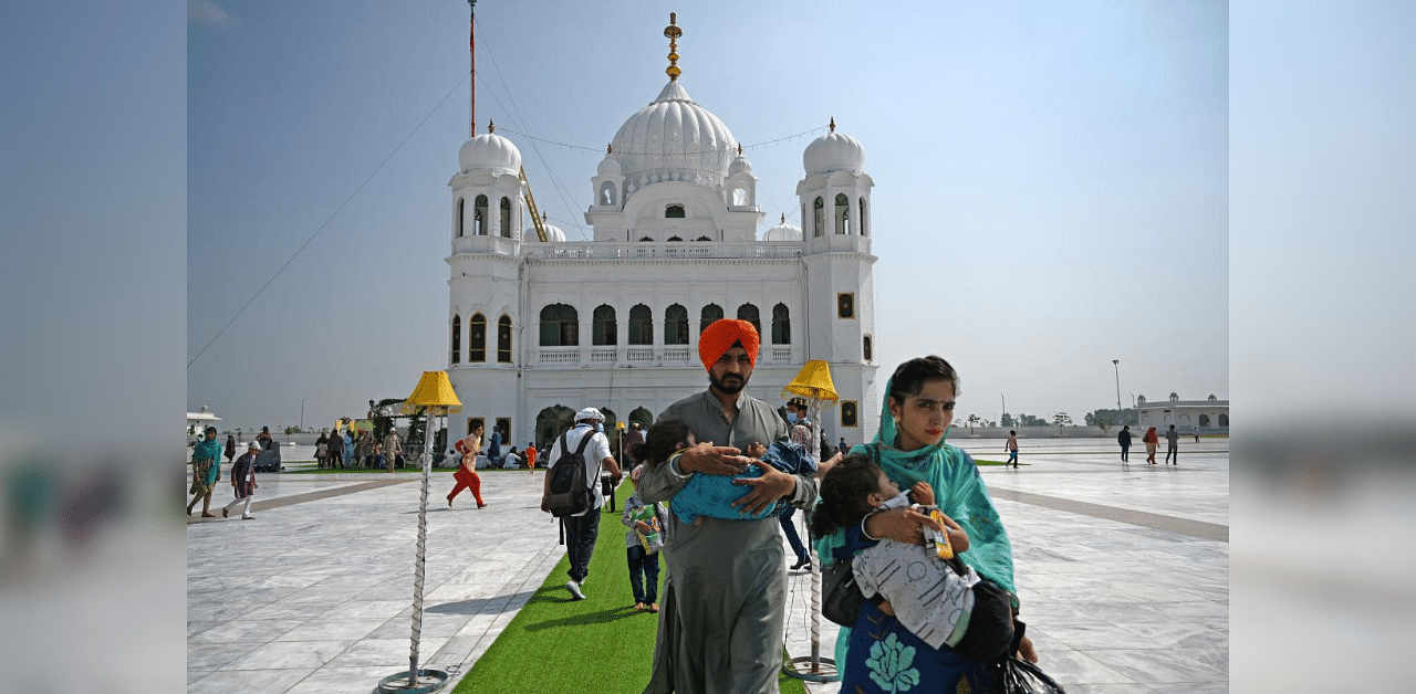 Sikh pilgrims  at the Gurdwara Darbar Sahib in Kartarpur . Credit: AFP 