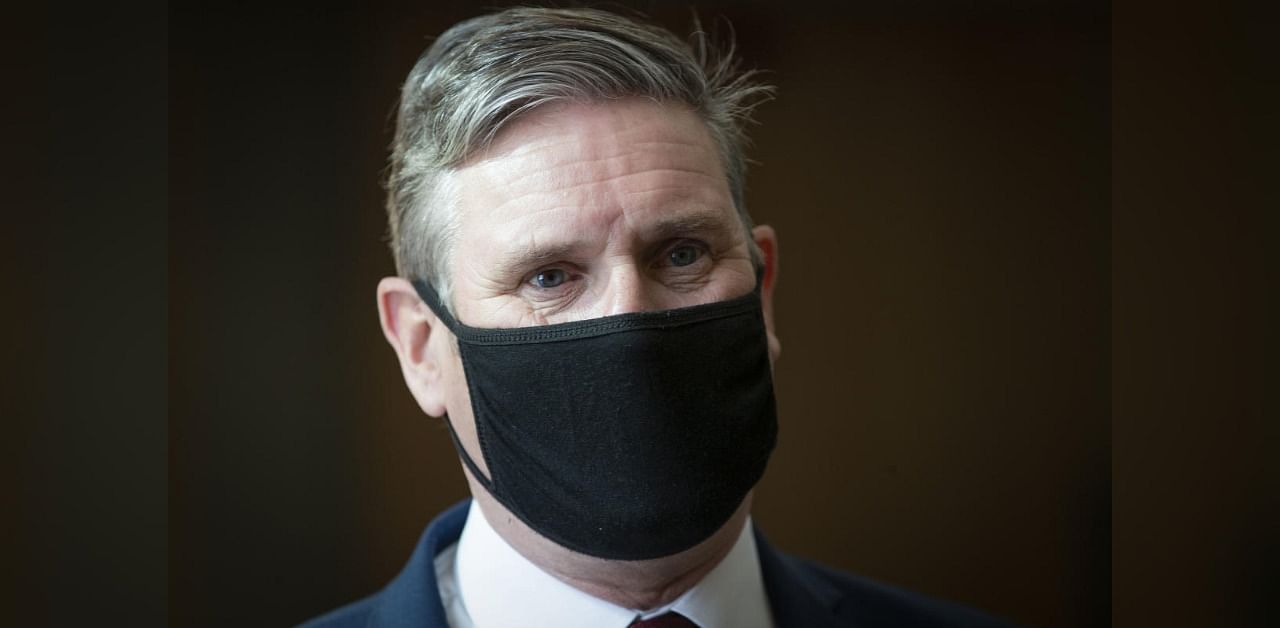 Britain's main opposition Labour Party leader Keir Starmer wears a face covering due to the Covid-19 pandemic. Credit: AFP