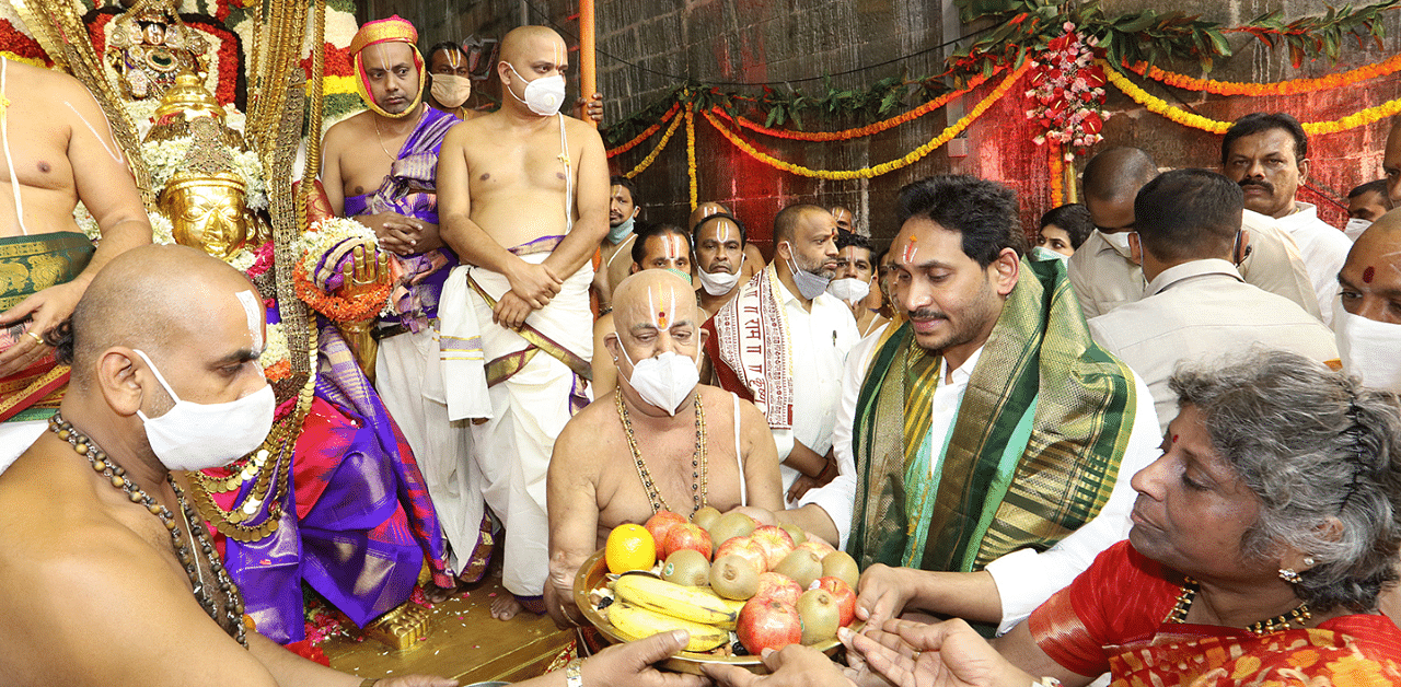 Andhra Pradesh CM Jaganmohan Reddy offered ‘silk vastrams’ to Lord Sri Venkateswara Swamy on behalf of the State Government on the occasion of Garuda Seva on Wednesday evening. Credit: DH Photo/By Arrangement