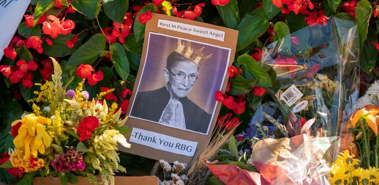 A makeshift memorial for late US Supreme Court Justice Ruth Bader Ginsberg is seen near the steps of the US Supreme Court. Credit: AFP