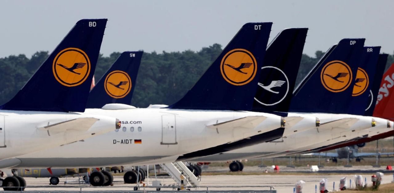 Airplanes of German carrier Lufthansa are parked at the Berlin Schoenefeld airport, amid the spread of the coronavirus disease. Credit: Reuters