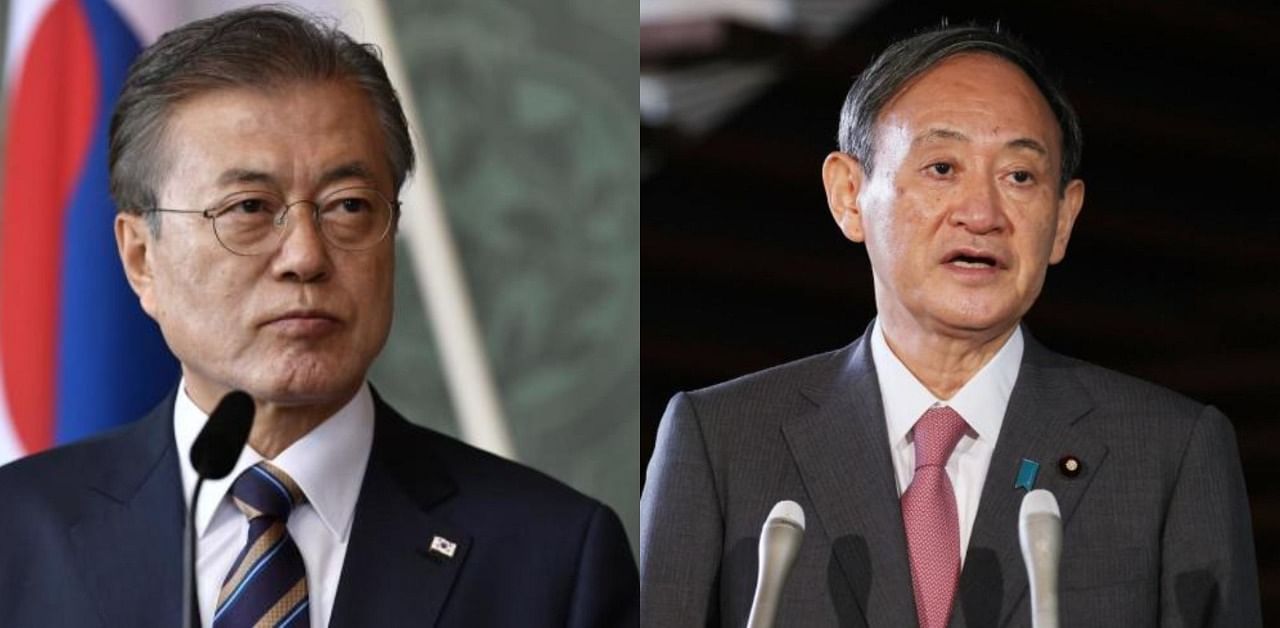South Korea's President Moon Jae-in and Japanese Prime Minister Yoshihide Suga. Credit: AFP Photos