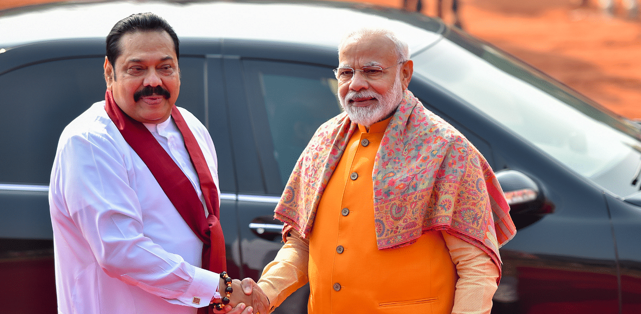 Prime Minister Narendra Modi welcomes Sri Lankan Prime Minister Mahinda Rajapaksa. Credit: PTI Photo