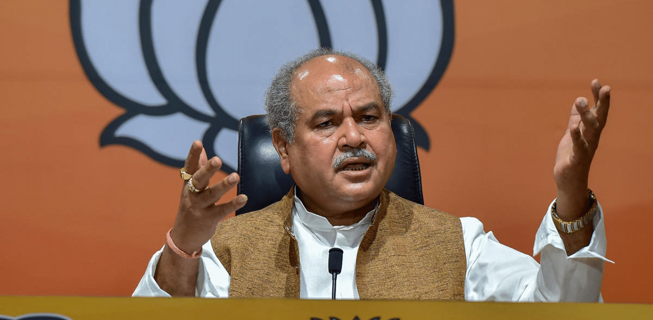 Union Minister for Agriculture & Farmers Welfare Narendra Singh Tomar addresses a press conference, at BJP HQ in New Delhi. Credit: PTI Photo