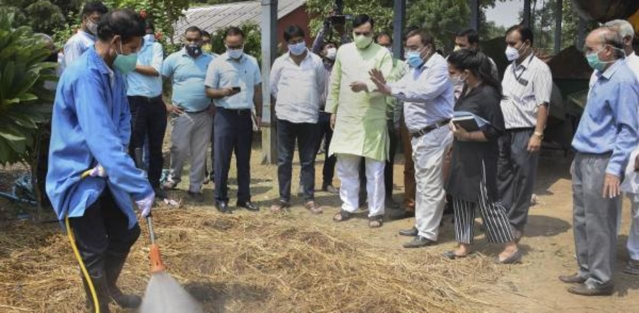 Delhi Environment Minister Gopal Rai during demonstration of bio-decomposer techinque to solve pollution related issues due to stubble burning in the winters, at Pusa Agricultural Institute in New Delhi. Credit: PTI Photo