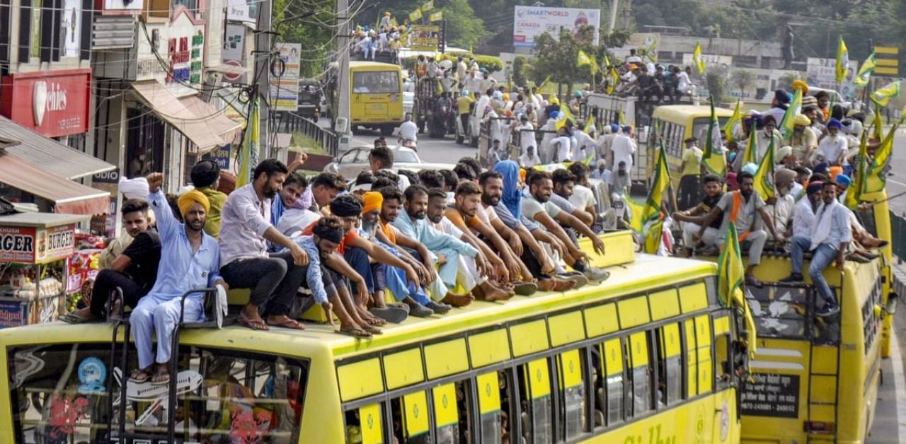  Members of various farmers' organizations on their way to stage a protest against the central government over agriculture related ordinances, in Patiala. Credit: PTI