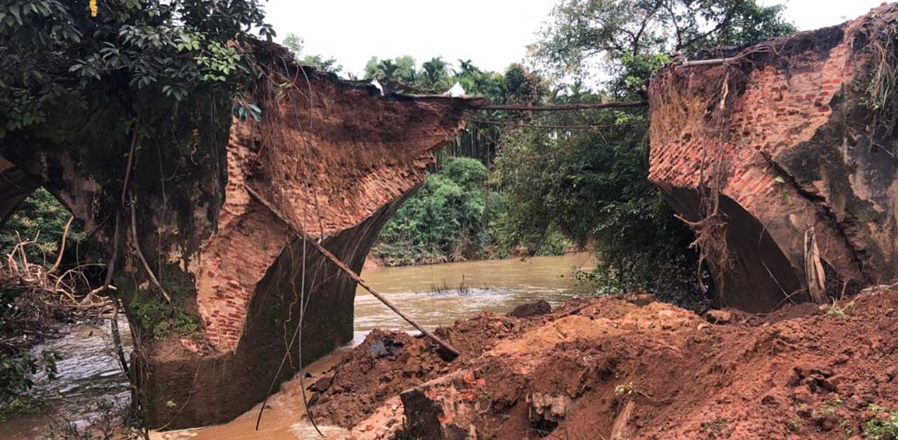 A mini bridge near Ranjadakatte in Thirthahlli taluk collapsed disrupting movement of vehicles on Agumbe road. Credit: DH Photo