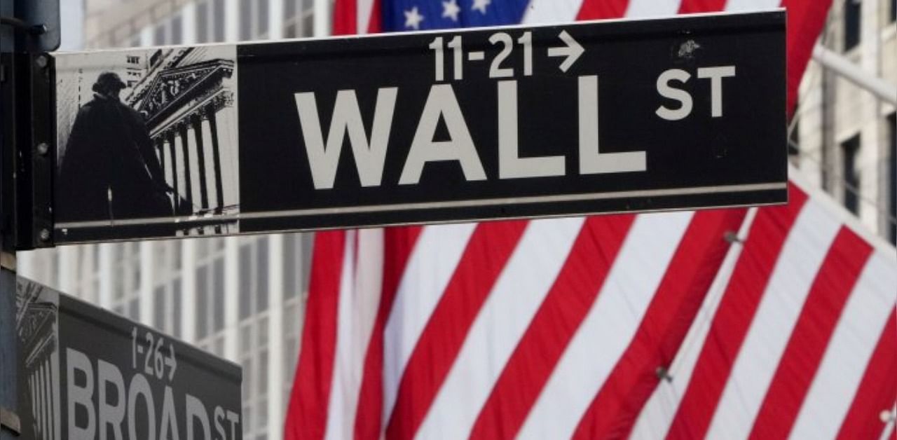 The Wall Street sign is pictured at the New York Stock exchange (NYSE) Credit: Reuters Photo  