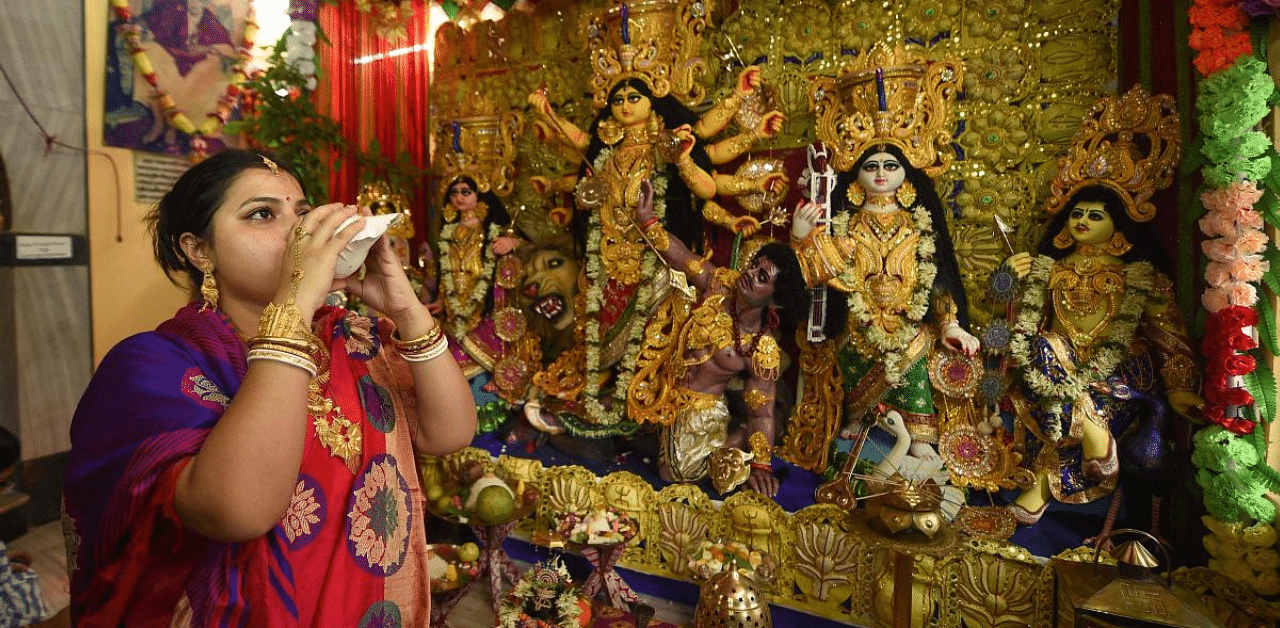 Major Durga Puja committees said they decided that visitors' flow to open-air marquees will be continuous to ensure social distancing. Credit: PTI Photo