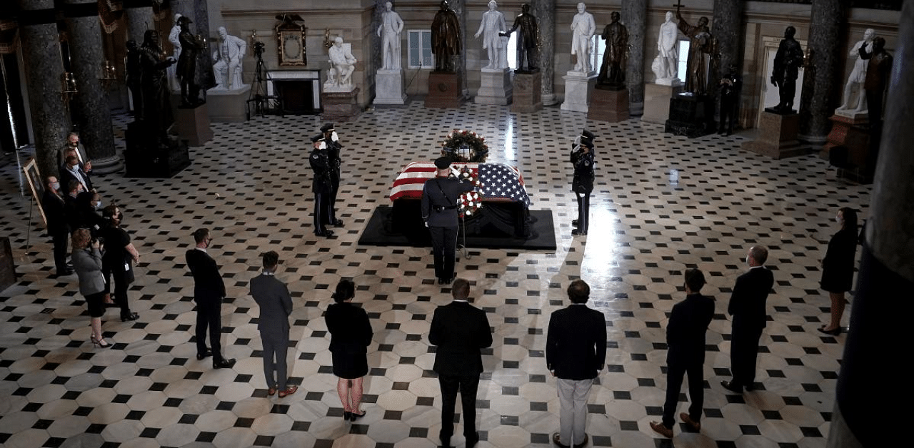 Capitol Hill staffers pay their respects to late Associate Justice Ruth Bader Ginsburg in the Statuary Hall, where she lies in state at the US Capitol. Credit: AFP Photo